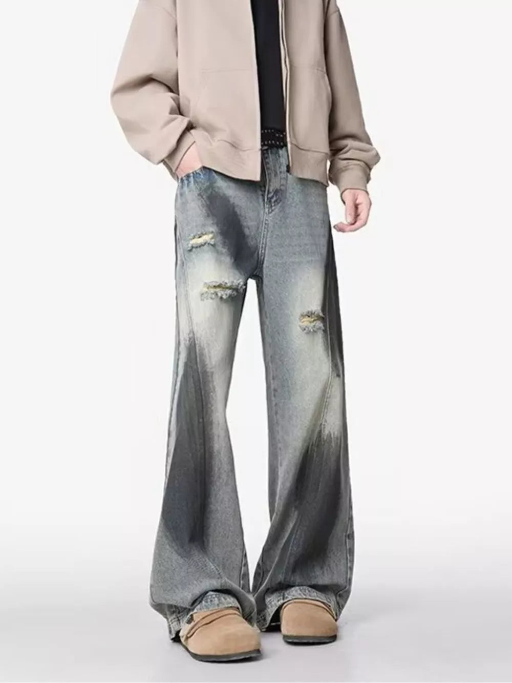Distressed wide-leg jeans with a belted detail and gradient wash.