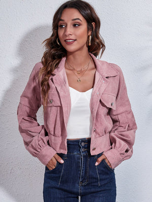 Dusty Pink corduroy cropped jacket with balloon sleeves and buttoned pockets.