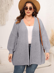 Chunky knit cardigan in cloudy blue with balloon sleeves and open front.