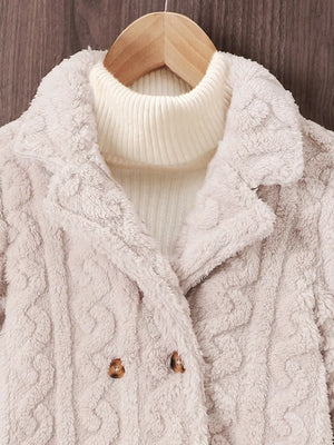 Cozy textured double-breasted pea coat in eggshell with a plush finish and wooden buttons.