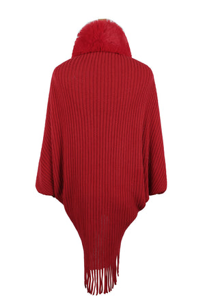 Deep Red knit cape with faux fur collar and fringe detail