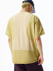 Relaxed fit t-shirt in light green with contrast stitching and paneling detail.