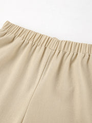 Tan cotton wide-leg pants with elastic waistband detail
