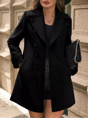 Black double-breasted wool blend trench coat with cuffed sleeves and a-line cut.