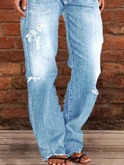 Light blue distressed denim maternity jeans with raw hem