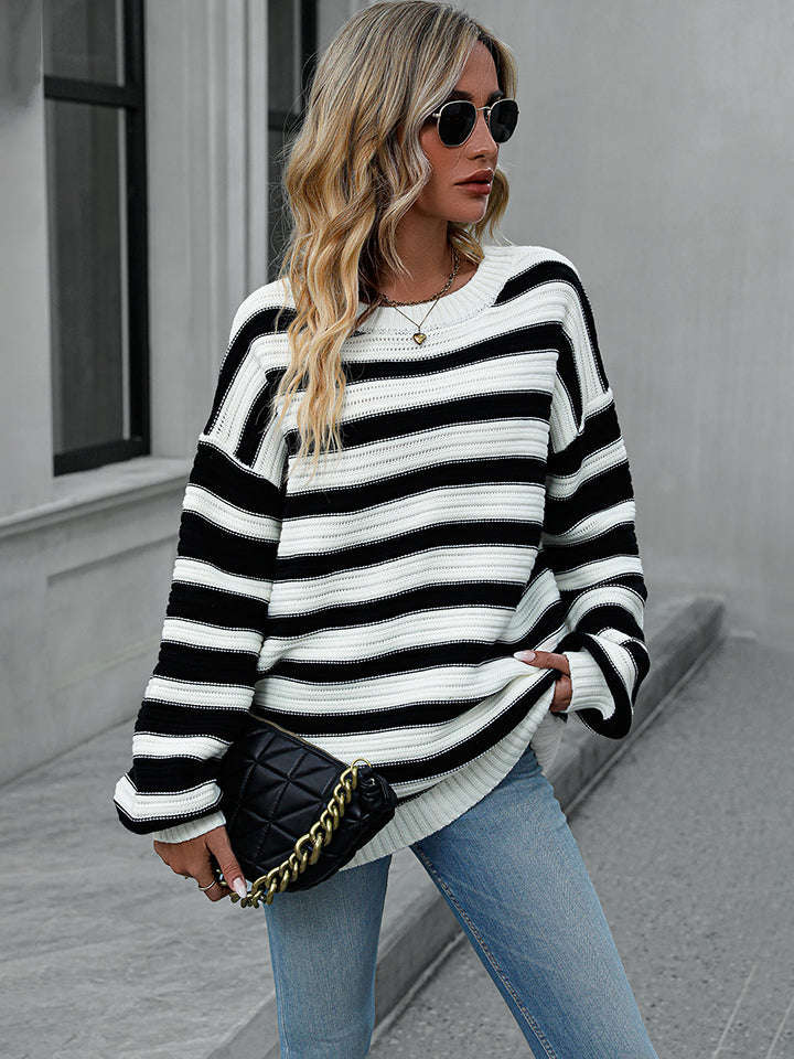 Chunky stripe relaxed fit knit sweater in black and white acrylic with crewneck.