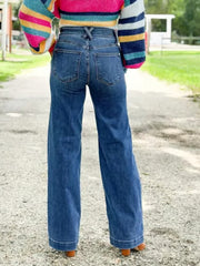 Medium wash denim wide leg jeans with utility pockets and a high waist.