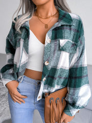 Oversized dark green tartan shacket with patch pockets and button front.