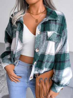Oversized dark green tartan shacket with patch pockets and button front.