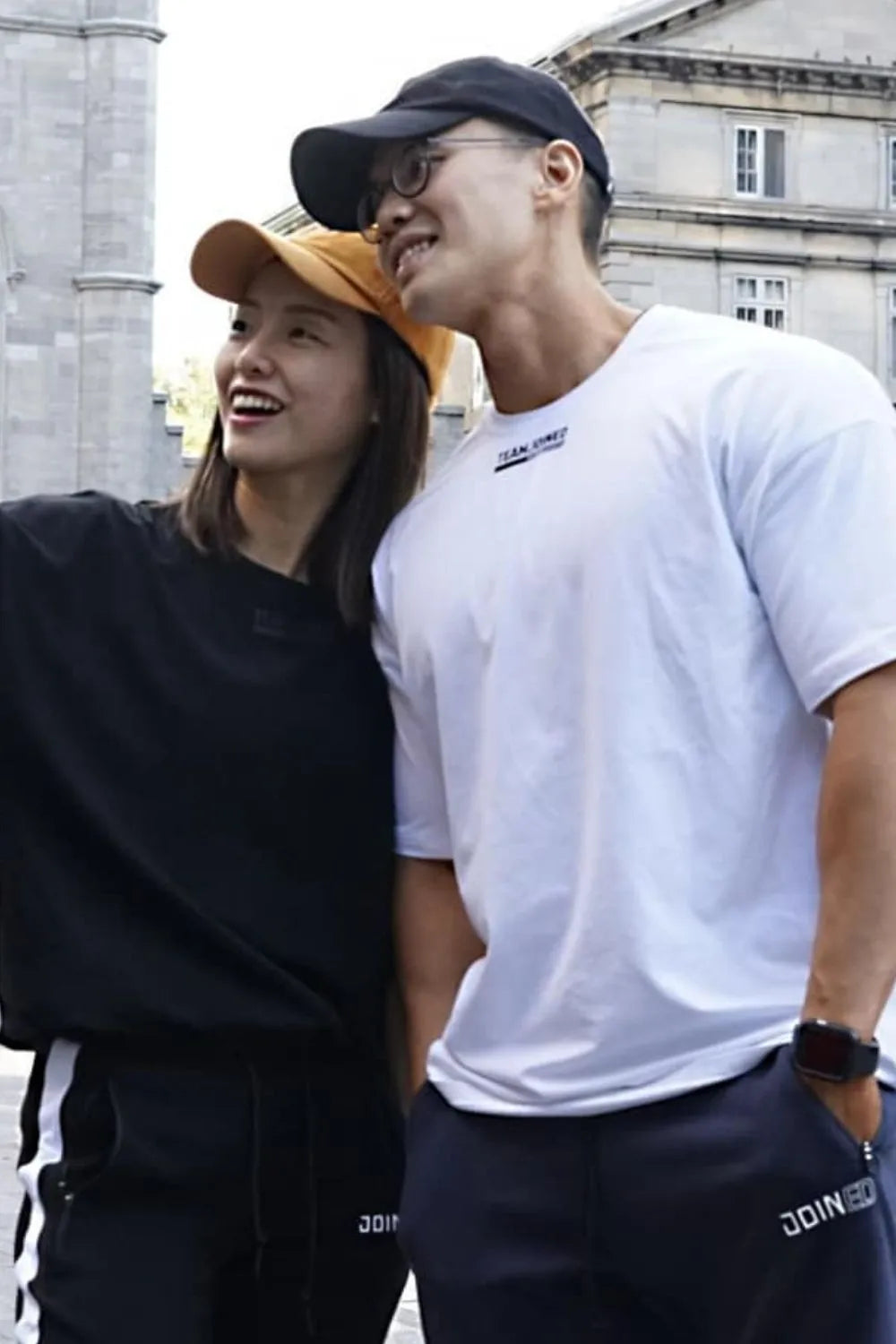 White oversized t-shirt with black logo detail on chest