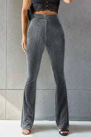 Ribbed velvet palazzo trousers in dark gray with a high waist and flared leg.