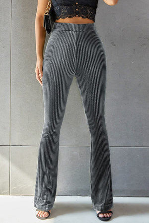 Ribbed velvet palazzo trousers in dark gray with a high waist and flared leg.