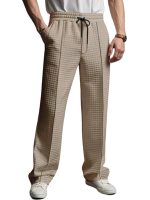 Khaki textured drawstring casual sweatpants for men with a waffle knit pattern.