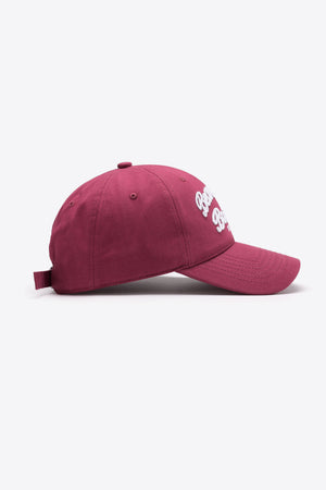 Deep Red baseball cap with white Boston script embroidery and adjustable strap.