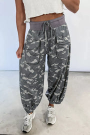 Camouflage barrel pants with cargo pockets and drawstring waist.