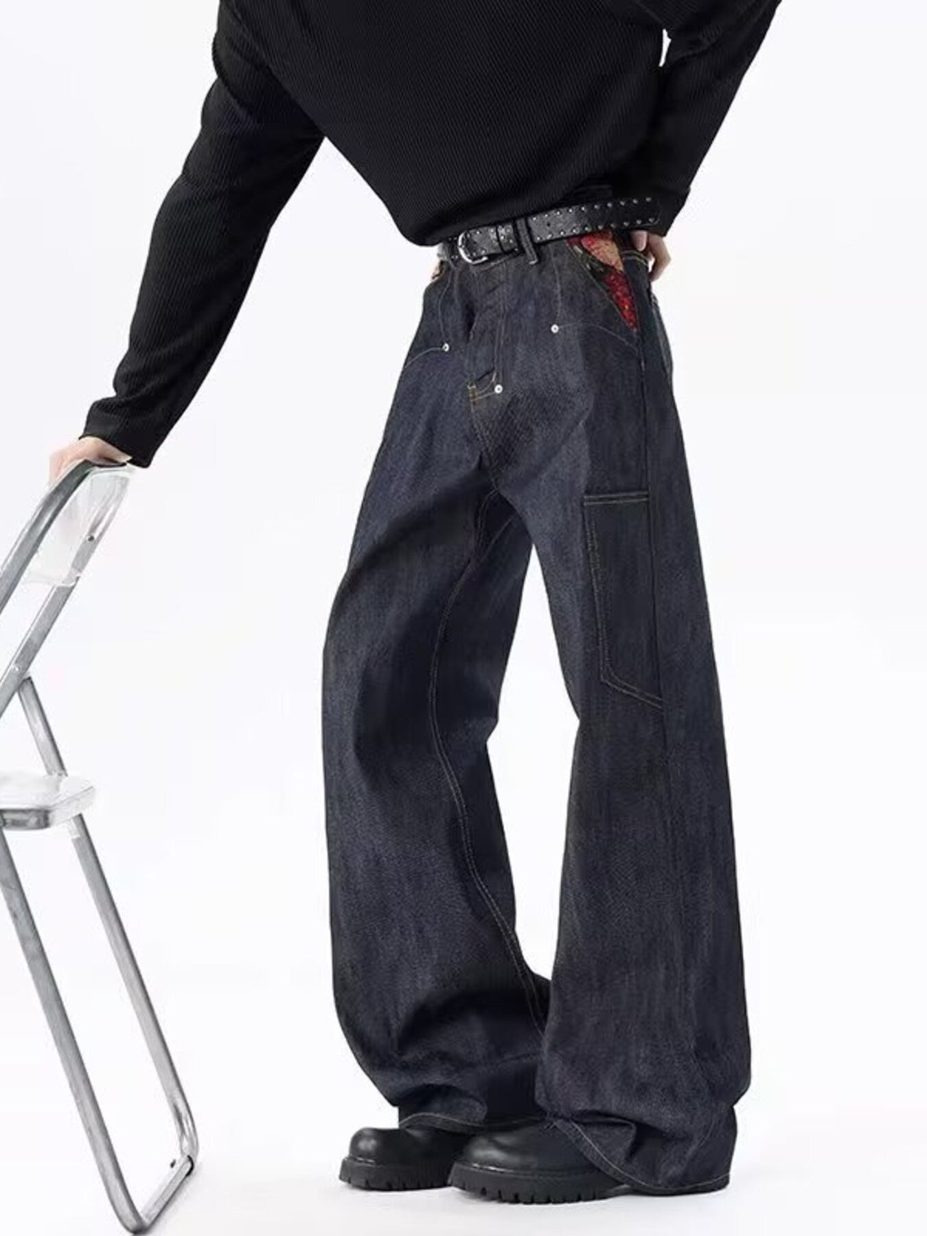 Men's dark wash 100% cotton wide-leg jeans with a baggy fit.