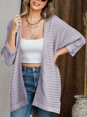 Textured ribbed sleeve cardigan in gray with open front and rolled cuffs.