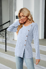 Light Blue ribbed tunic top with asymmetric hem and button detail.