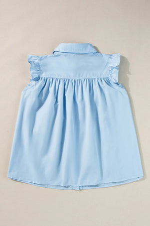 Light blue poplin ruffled yoke sleeveless blouse with gathered detail.