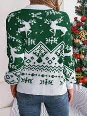 Green acrylic knit sweater with white reindeer and snowflake fair isle pattern.