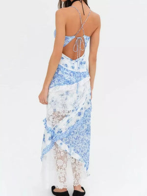 Blue floral maxi dress with lace detailing and open back with tie closure.