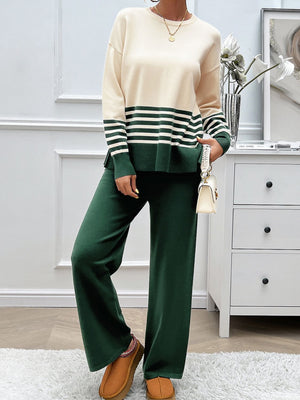 Color-blocked knit lounge set with cream top, dark green stripes, and matching wide-leg pants.