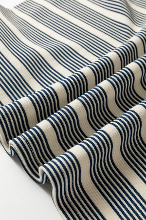 Navy and cream striped midi dress fabric detail