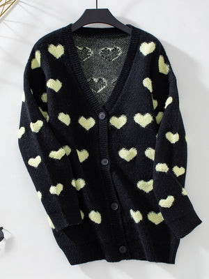 Black acrylic knit cardigan with allover light yellow hearts and button front.