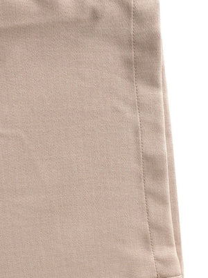 Halter neck wide leg jumpsuit in beige fabric with visible stitching detail.