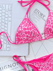 Hot Pink leopard print tie-side bikini set with adjustable straps and tie bottoms.