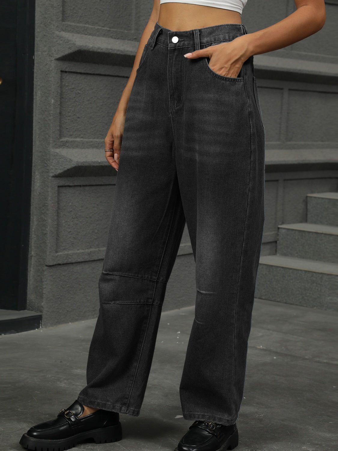 Relaxed fit dark wash denim trousers with patchwork knee detail and wide leg