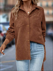Brown corduroy shirt jacket with stud detailing on the shoulders and chest pockets.