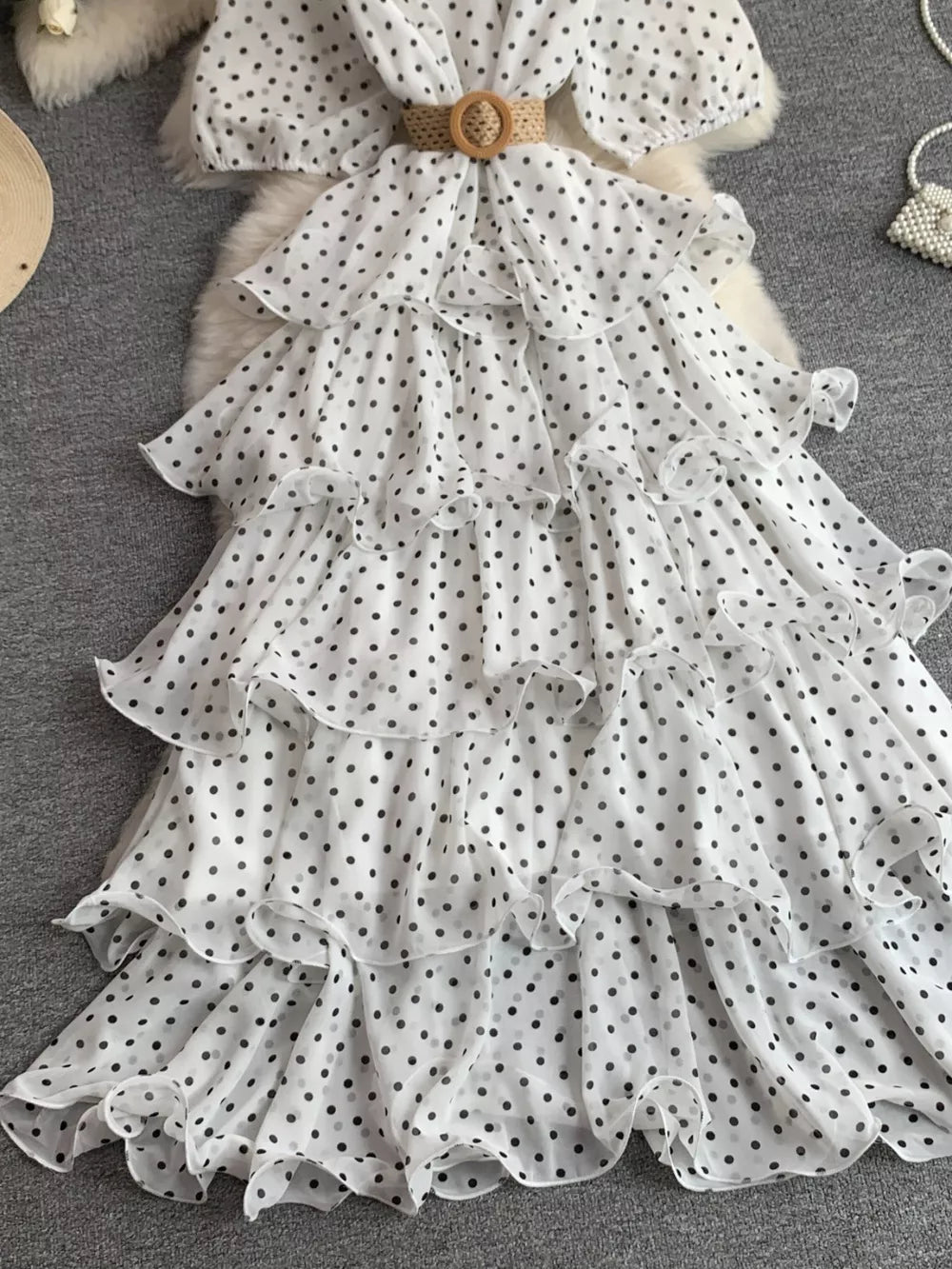 White polka dot tiered ruffle dress with belt