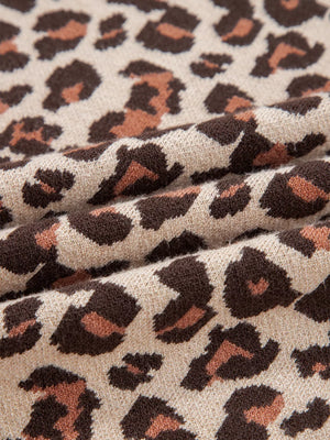 Leopard print ribbed sweater dress in beige with brown and pink animal print pattern.