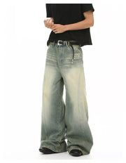 Timeless wide leg denim trousers in light wash with a relaxed fit and subtle fading.