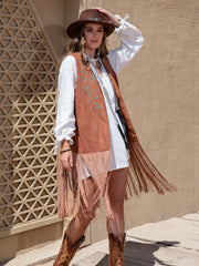 Faux suede fringe vest in terracotta with embroidered vine detail and long fringe.