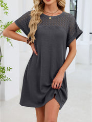 Dark gray t-shirt dress with short sleeves, crew neck, and sheer lace yoke detail.