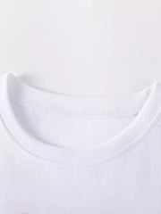 White baby dress neckline detail, cotton fabric with rainbow heart applique.