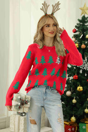 Red crewneck sweater with green tree motif and sequin tree detail.