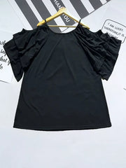 Black t-shirt with gathered neckline and ruffled cold-shoulder sleeves.