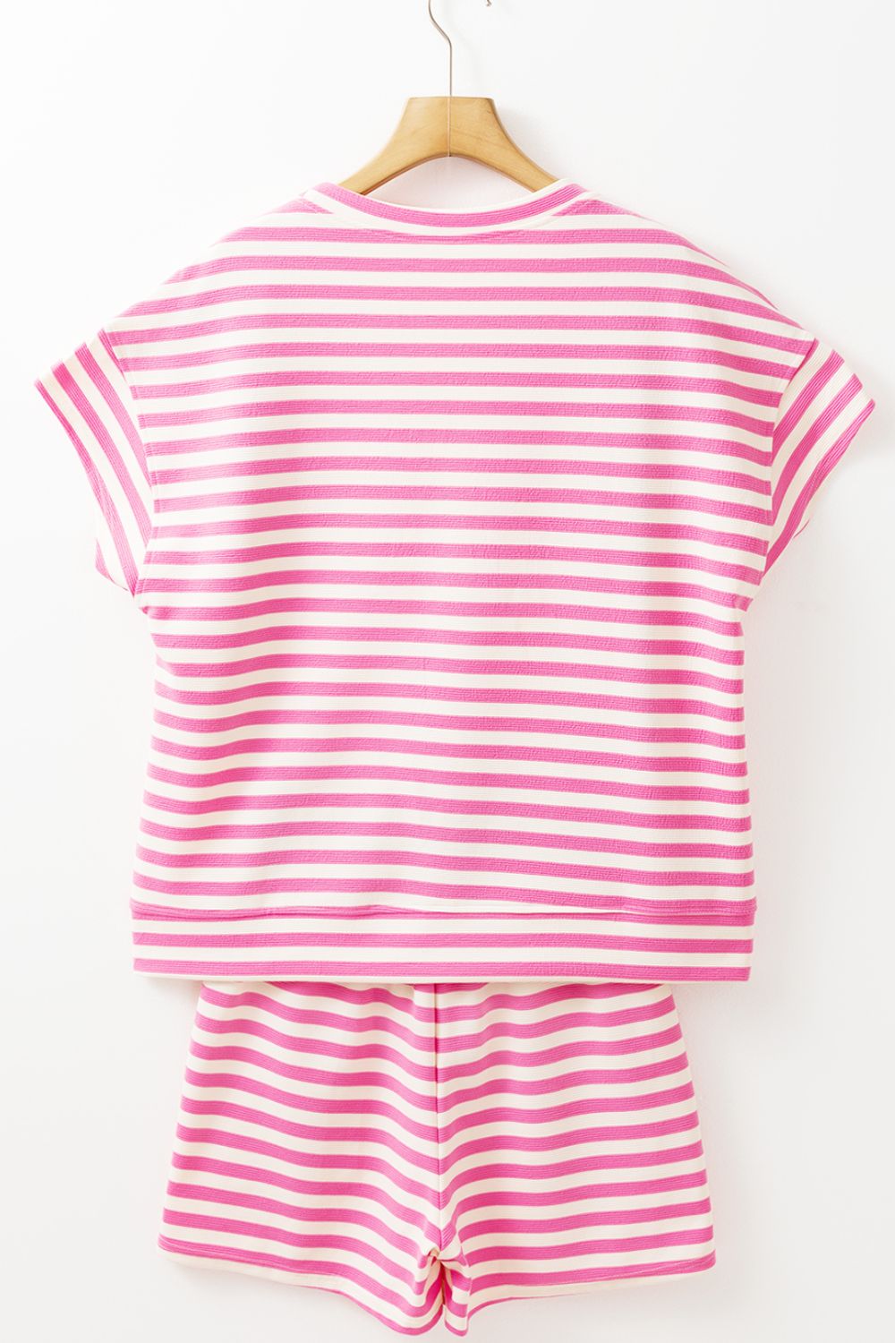 Pink stripe loungewear set with a short sleeve top and shorts.