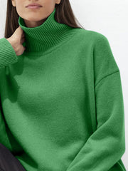 Dark Green relaxed fit ribbed turtleneck knit sweater with a high neck.