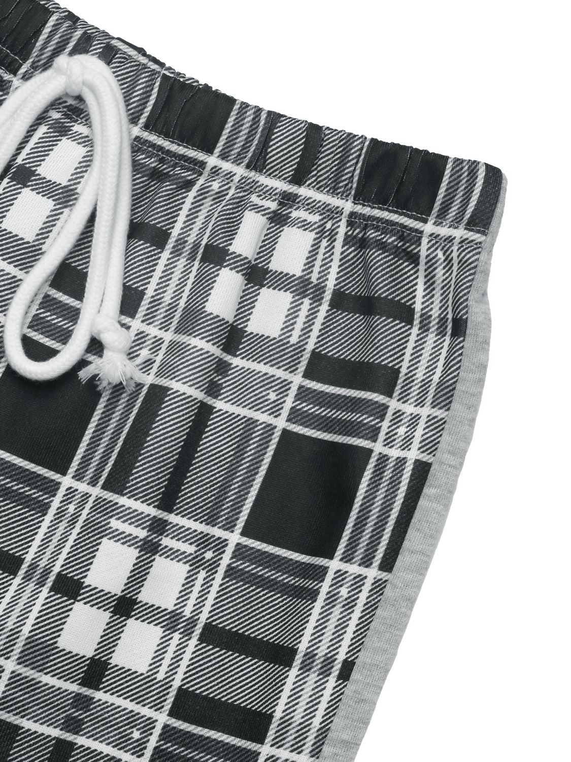 Plaid wide-leg track pants in black with white and grey plaid pattern and grey side stripe.