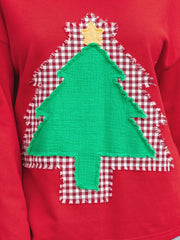 Red cotton sweatshirt with a green Christmas tree applique on red and white gingham.