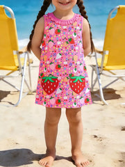 Toddler pink cotton dress with strawberry and floral print, ruffled neckline.