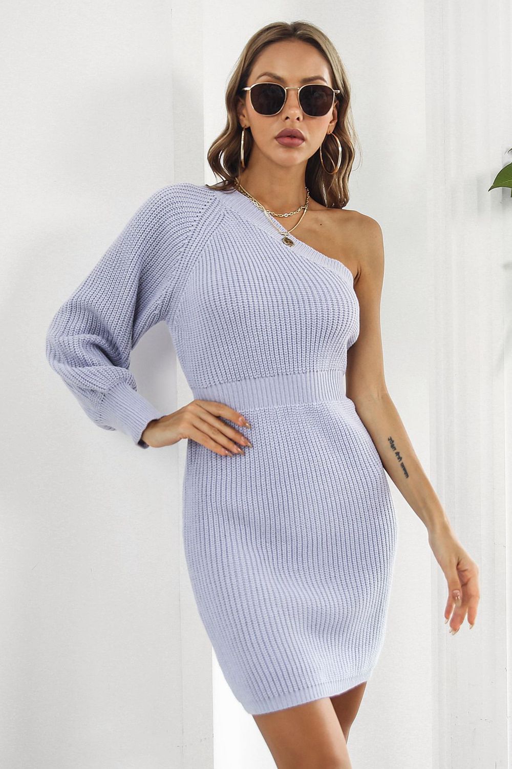 Lavender ribbed knit dress with one balloon sleeve and asymmetrical neckline