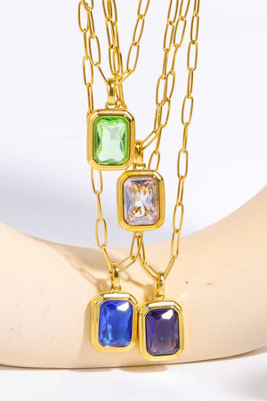 Gilded Prism Pendant Necklace with 18K gold chain and rectangular gemstone pendants in royal blue, purple, light green, and