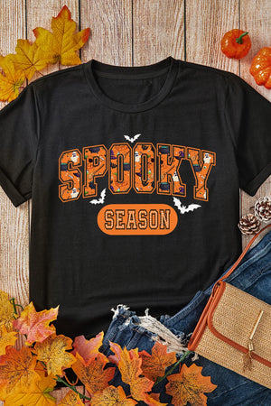 Black Halloween graphic tee with retro font and spooky season design.