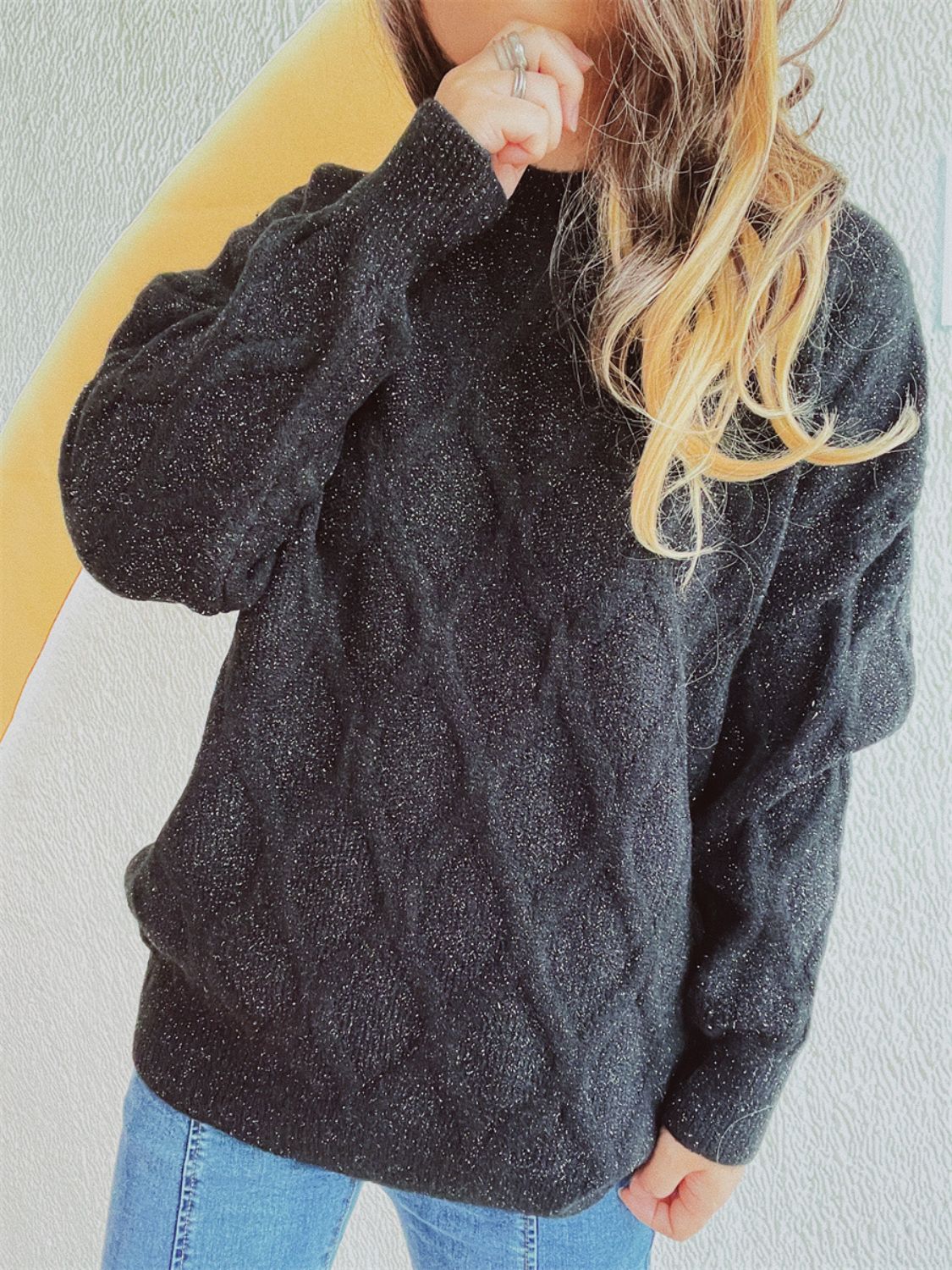 Sparkle knit relaxed fit sweater in black with a subtle shimmer, long sleeves and crew neck.