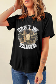 Black cotton blend graphic tee with a bull skull and cactus design and "Can't Be Tamed" text.